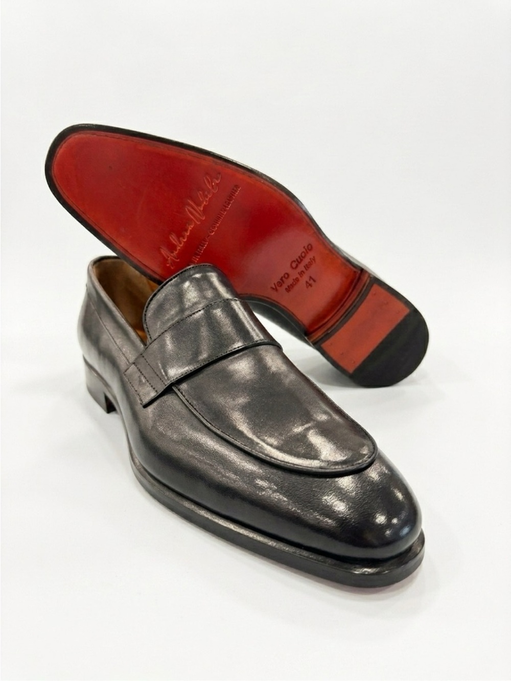 Classic Black Leather Men's Penny Loafers with patent red button